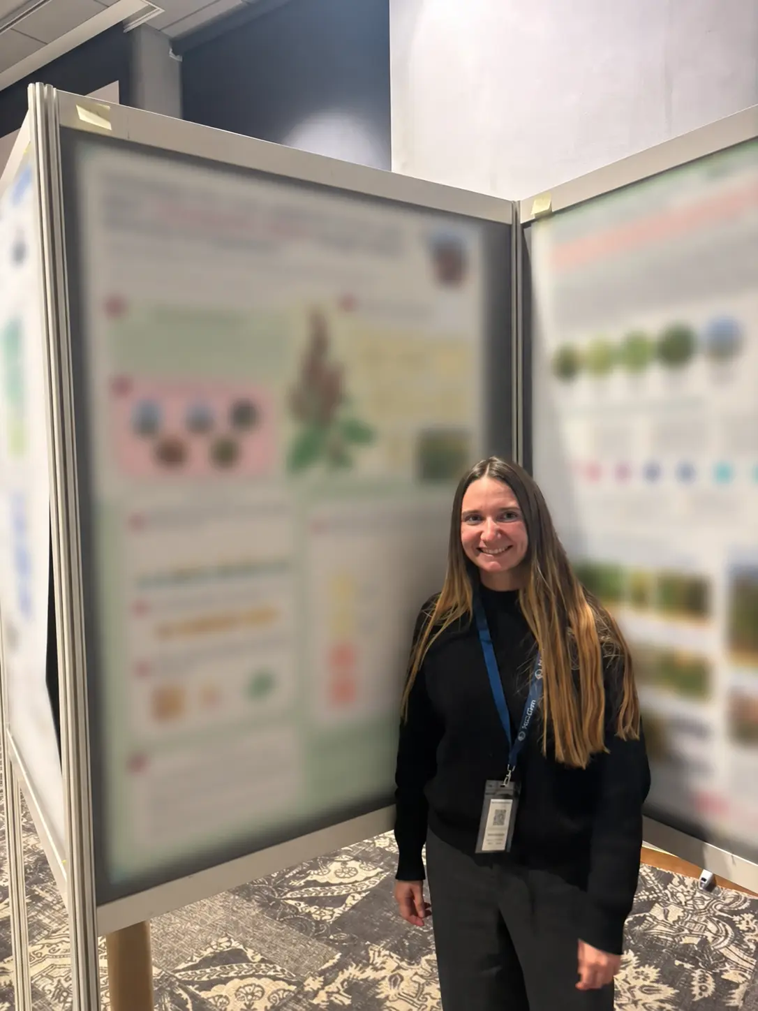 Alexandra Sanfeliu Meliá beside her research poster on Chenopodium album at the Seeds of Resilience Conference